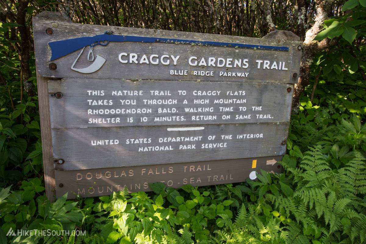 Craggy Gardens. 
The trailhead is at the southern side of the parking lot. Look for the large sign.