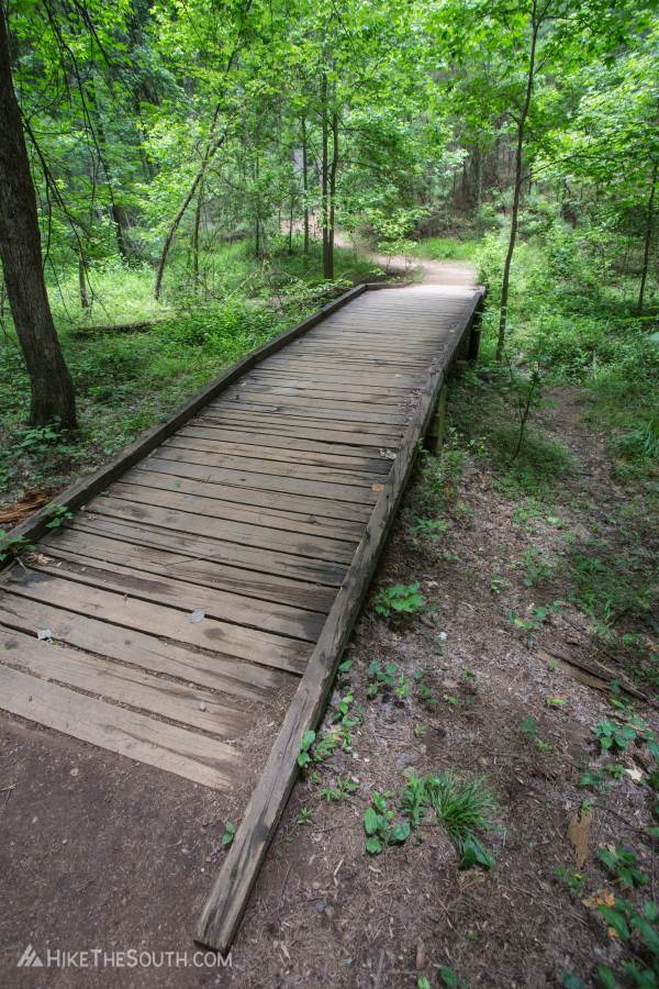 Red Top Mountain Sweet Gum Trail. 
Bridges get you over small creeks. No rock hopping required.